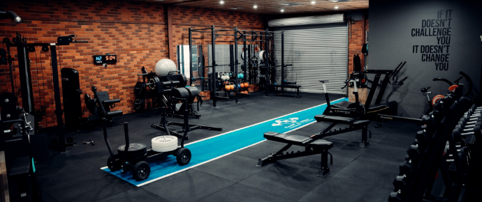 Modern gym with weights.