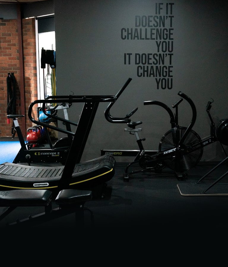 Gym workout equipment and motivational quote